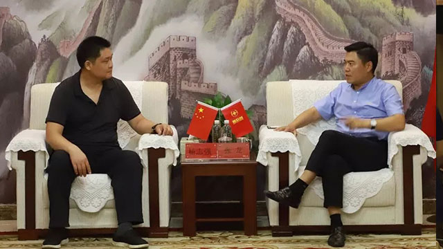 新农创集团总裁张龙与中铁建工集团设计院党委书记杨志强
